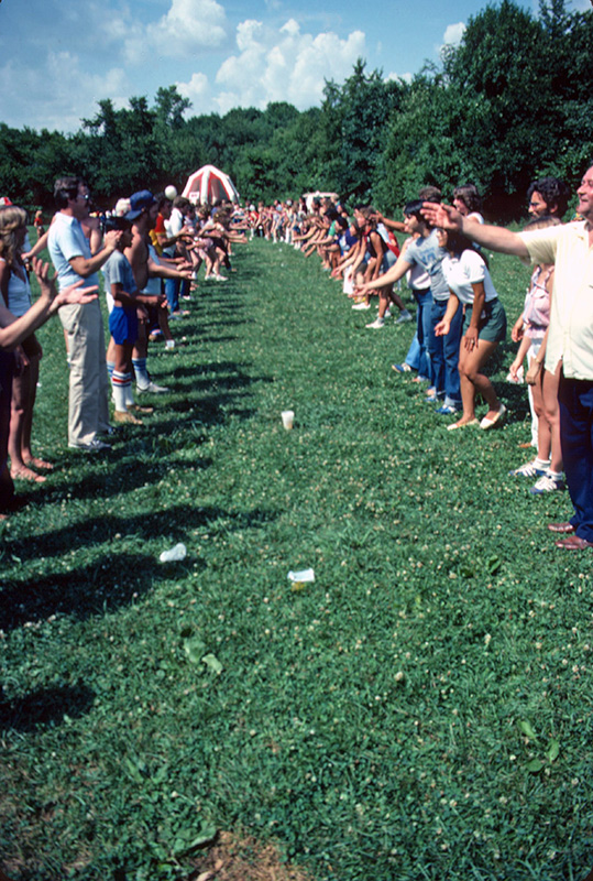 Inland employees and their families enjoying the 1982 summer company picnic games